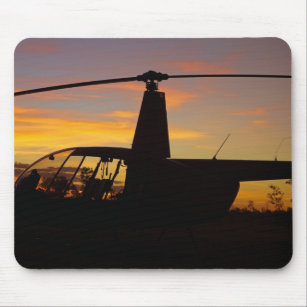 Robinson R44 helicopter at sunset Mouse Pad