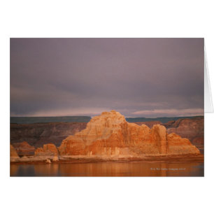 Rock formations by calm water, Lake Powell,