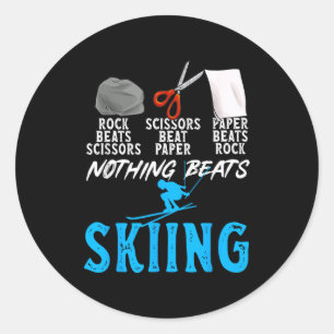 Rock paper scissors nothing beats skiing classic round sticker