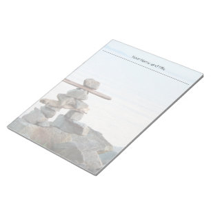 Rock stacking art by the beach. photo by Hao zhang Notepad