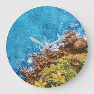 Rocks in the sea, above view 1 large clock