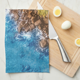 Rocks in the sea, above view 1 tea towel