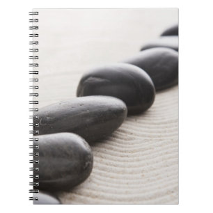 Rocks on sand notebook