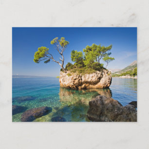 Rocks, sea and a tiny island postcard