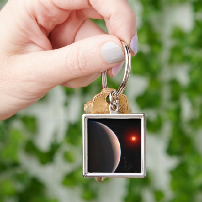 Rocky Exoplanet Gj 486 B Orbiting A Red Dwarf Star Key Ring (Hand)