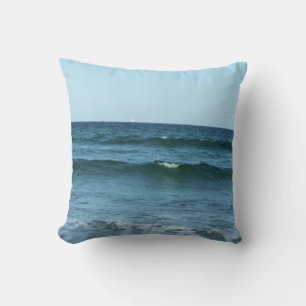 Rolling Blue Waves With Distant Sailboat Horizon Cushion