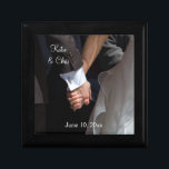 Romantic and Elegant Wedding Couple Holding Hands Gift Box<br><div class="desc">A romantic and elegant wedding photograph of a couple holding hands. The image focuses on the couples hands clasped together in love,  while wearing their fancy wedding attire. She in her wedding gown and he in his tux. Personalise with your wedding details for an endearing memento.</div>