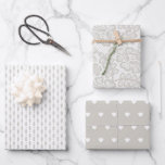Romantic Christmas Pastel Grey Wrapping Paper Sheet<br><div class="desc">These wrapping paper sheets are each printed with a different design. One has a vertical linear design,  one has a lace design and the third has a repeating heart pattern. Shades of grey and white. Romantic Christmas Pastel Grey Wrapping Paper Sheets</div>