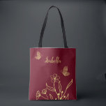 Romantic elegant gold flower burgundy tote bag<br><div class="desc">Unique simple tote bag featuring romantic and elegant gold flowers on burgundy background
FOR MORE MATCHING PRODUCTS click on the collection above or contact me.</div>