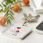Romantic illustration of a couple key ring<br><div class="desc">This elegant square acrylic keychain captures a tender and fun moment of love. A young couple enjoys a playful piggyback ride as she holds a vibrant red heart balloon, with hearts and confetti dancing around them. Featuring the heartfelt quote 'Every day with you is a beautiful adventure', this keychain is...</div>
