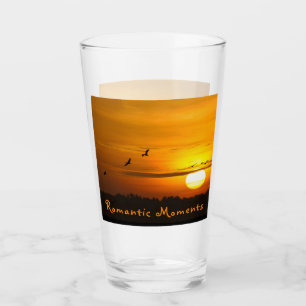 Romantic moments Cranes at sunrise photo with text Glass