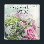 Romantic Mr. & Mrs. Pink Rose Floral Wedding Magnet<br><div class="desc">Romantic personalized Mr. and Mrs. magnet. This pretty magnetfeatures the words "mr and mrs" in an elegant black hand lettered script with curly swashes, and a pink floral rose bouquet background. You can personalize it with your surname, and even change the text color and font style using the customize option....</div>