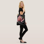 Romantic Pink Floral Bouquet Mother of the Bride Tote Bag<br><div class="desc">Romantic and moody, this tote bag is the perfect gift for members of your bridal party. The floral design features a natural bouquet of blush pink roses and stunning ranunculus with dark green leaves in a luxurious arrangement on a black watercolor wash. You can personalise with a name or bridal...</div>