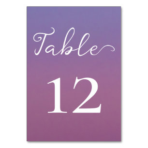 Romantic purple sunset snowy mountains wedding table number