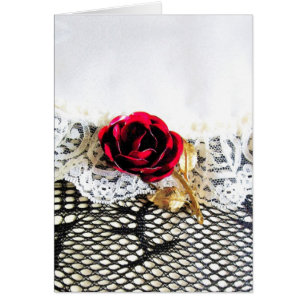 Romantic red rose and white lace