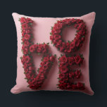 Romantic Red Rose 'LOVE' Floral Pillow<br><div class="desc">Elevate your home decor with this luxurious and romantic decorative pillow featuring the word 'LOVE' meticulously crafted from vibrant, deep red roses. Perfect for Valentine's Day, anniversaries, weddings, or as a year-round expression of affection. The stunning floral design is set against a soft pink backdrop, making it an eye-catching accent...</div>