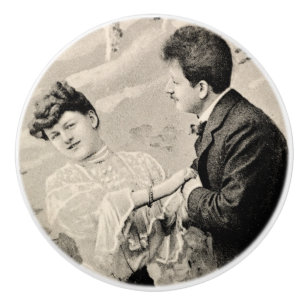 Romantic vintage lovers on a boat ceramic knob