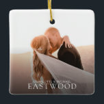 Romantic Wedding Photo Keepsake Ceramic Ornament<br><div class="desc">A favourite wedding photo becomes a romantic keepsake with this elegant serif design. Clean lines and timeless typography frame your image in a modern,  refined style that feels both personal and elevated. Whether gifted to newlyweds or displayed in your own space,  it’s a lasting way to celebrate love.</div>