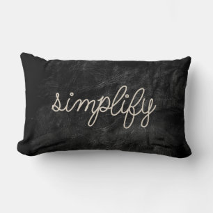 rope simplify text on black leather lumbar cushion