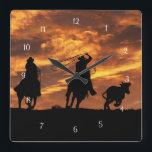Roping Cowboys in the Sunset Square Wall Clock<br><div class="desc">Team ropers trying to get the last steer before the sunset.  A very cool southwestern cowboy ranching image.</div>