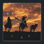 Roping Cowboys in the Sunset Square Wall Clock<br><div class="desc">Team ropers trying to get the last steer before the sunset.  A very cool southwestern cowboy ranching image.</div>