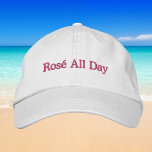 Rosé All Day / Preppy Wine Baseball Cap<br><div class="desc">Add a pop of playful, preppy style to your look with this “Rosé All Day” embroidered baseball hat. Featuring soft pink stitching on a classic white cap, this chic and feminine design is perfect for wine lovers who love effortless style. Whether you're heading to brunch, a girls trip, the beach,...</div>