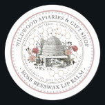 Rose Beeswax Lip Balm Vintage Skep with Honeycomb  Classic Round Sticker<br><div class="desc">Custom Lip Balm label with vintage illustration of a bee-hive surrounded by an old world garden with wildflowers,  roses and little bees. Dotted circle border. Honeycomb Pattern in background. Personalise with your name,  apiary,  location and cell phone,  and ingredient list.</div>