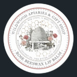 Rose Beeswax Lip Balm Vintage Skep with Honeycomb  Classic Round Sticker<br><div class="desc">Custom Lip Balm label with vintage illustration of a bee-hive surrounded by an old world garden with wildflowers,  roses and little bees. Dotted circle border. Honeycomb Pattern in background. Personalise with your name,  apiary,  location and cell phone,  and ingredient list.</div>