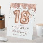 Rose Gold Balloons 18th Birthday Welcome Sign<br><div class="desc">Welcome to the laughter-filled realm of adulthood as we celebrate the grand 18th birthday bash with our Rose Gold Blush Pink Balloons Confetti Birthday Party Pedestal Welcome Sign. This sign is more than just a greeting; it's your ticket to a memorable and humour-infused celebration. The elegant blush pink and rose...</div>
