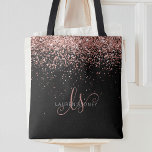 Rose Gold Blush Pink Glitter Glam Monogram Name Tote Bag<br><div class="desc">Glam Rose Gold Glitter Elegant Monogram Tote Bag. Easily personalise this trendy chic tote bag design featuring elegant rose gold sparkling glitter on a black background. The design features your handwritten script monogram with pretty swirls and your name.</div>