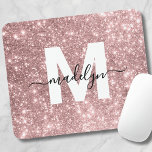 Rose Gold Blush Pink Glitter Name Monogram Mouse Pad<br><div class="desc">Personalised Blush Pink Glitter Initial Monogram Mouse Pad. Add a touch of glam and elegance to your workspace with this stylish mouse pad. Featuring a faux rose gold blush pink glitter background, a crisp white initial letter, and a sleek black script name, this design is perfect for anyone who loves...</div>
