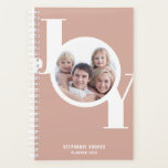 Rose Gold Custom Photo 2023 Planner<br><div class="desc">This modern and stylish 2023 Planner features the word JOY in bold typography on a blush pink,  rose gold background.
Easily customisable with your photo,  year,  and name.</div>