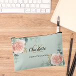 Rose gold floral green name monogram accessory pouch<br><div class="desc">Green background,  black and golden text. Decorated with watercolored rose gold roses,  eucalyptus greenery and golden sprigs. 
Personalise and add your first name,  monogram initials and full name.</div>