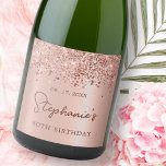 Rose Gold Glitter 80th Birthday Monogram Script Sparkling Wine Label<br><div class="desc">Elegant Modern Sparkle Rose gold glitter metallic Personalised Monogram Name 80th (or ANY AGE) Birthday Party Wine Label. This Girly Adult feminine Birhday party design featuring a Monogram Name in a stylish handwritten calligraphy script and date and age on blush pink or rose gold faux brushed metallic foil look background...</div>