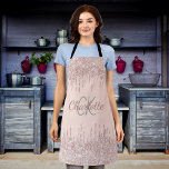 Rose gold glitter drips girly monogram name apron<br><div class="desc">A rose gold background decorated with rose gold,  pink sparkling faux glitter drips,  paint dripping look. Personalise and add your monogram initials and name.</div>