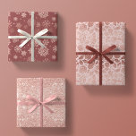 Rose Gold Glitter Elegant Christmas Gift Wrapping Paper Sheet<br><div class="desc">this sparkling collection of glamourous glitter features 3 different designs. 1.) solid rose gold glitter faux foil print from seam to seam, 2.) rose gold glitter snowflakes on a dusty rose / mauve coloured background and 3.) a soft flat rose quartz blush pink background with a festive rose gold glitter...</div>