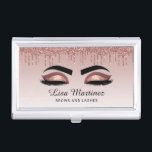 Rose Gold Glitter Lash Brow Beauty Business Card Holder<br><div class="desc">Chic business card case featuring rose gold faux glitter dripping from the top, an illustration of eyes with rose gold glittered eye shadow and dramatic eyebrows and eyelashes, and your name in a script against rose gold ombre background. Perfect for professionals in beauty salons, makeup artists, hair stylists, estheticians and...</div>