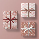 Rose Gold Glitter Pink White  Mauve Christmas Gift Wrapping Paper Sheet<br><div class="desc">this sparkling collection of glamourous glitter features 3 different designs. 1.) solid rose gold glitter faux foil print from seam to seam, with beautiful ornate white snowflakes 2.) blush pink rose quartz sparkle dressed with a seamless pattern of white hand drawn christmas trees, and 3.) a rich mauve / matte...</div>