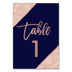 Rose gold glitter script navy blue table number