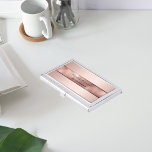 Rose gold metallic elegant modern business business card holder<br><div class="desc">An elegant, simple minimalistic and modern business card holder . A rose gold and pink metallic looking background with a rose gold band. Personalise and add your name and text/title on front. Black letters. The name is written with a modern and trendy hand lettered style script. Perfect for female entrepreneurs,...</div>