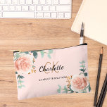 Rose gold pink floral greenery name monogram accessory pouch<br><div class="desc">A rose gold,  pink background,  black and golden text. Decorated with watercolored rose gold roses,  eucalyptus greenery and golden sprigs. 
Personalise and add your first name,  monogram initials and full name.</div>