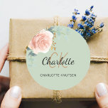 Rose gold pink floral sage green thank you classic round sticker<br><div class="desc">A sage green background. Decorated with a watercolored rose gold and blush pink floral,  rose,  eucalyptus leaves,  sprigs,  greenery,  faux gold leaves.  Personalise and add your first name,  monogram initials and full name. Perfect for birthday favours,  a bridal shower or baby shower.</div>