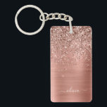 Rose Gold Pink Glitter Brushed Metal Monogram Key Ring<br><div class="desc">Rose Gold - Blush Pink Faux Foil Metallic Sparkle Glitter Brushed Metal Monogram Name Keychain. This makes the perfect sweet 16 birthday,  wedding,  bridal shower,  anniversary,  baby shower or bachelorette party gift for someone that loves glam luxury and chic styles.</div>