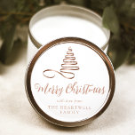 Rose Gold Ribbon Tree Merry Christmas Script Classic Round Sticker<br><div class="desc">This modern holiday sticker features a rose gold ribbon Christmas tree above the words "Merry Christmas" in stylish rose gold calligraphy script. Personalise it with your family's name in serif font.</div>