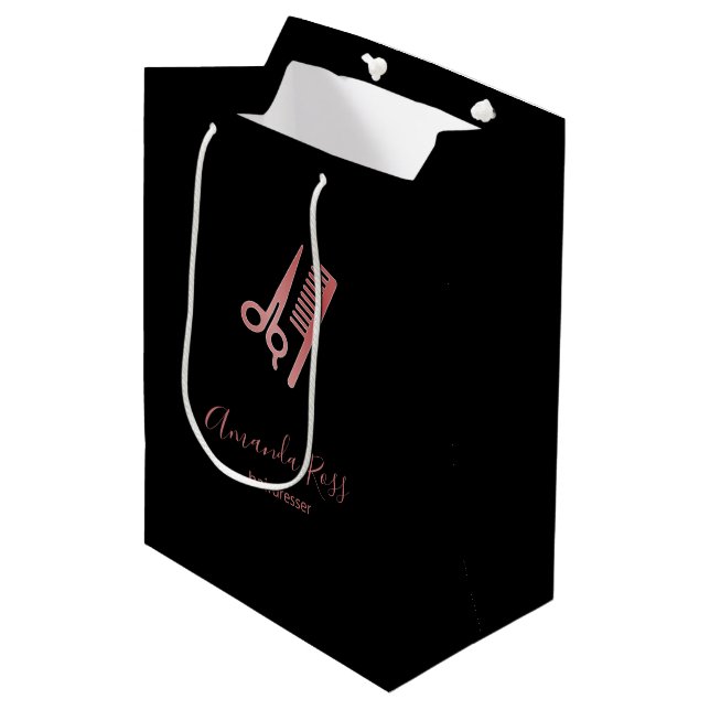 Rose gold scissors and comb black medium gift bag (Front Angled)