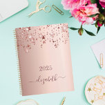 Rose gold stars dripping monogram name girly 2025 planner<br><div class="desc">A faux rose gold metallic looking background with elegant faux rose gold glittery and shining stars falling, dripping. Personalise and add a year 2025 and a name. The name is written in dark rose gold with a large modern hand lettered style script with swashes. To keep the swashes only delete...</div>