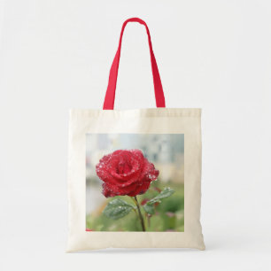 Rose in raindrops tote bag