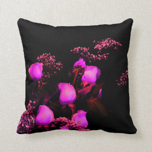 rose spray magenta against black cushion