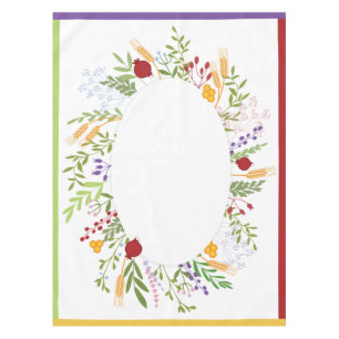 Rosh Hashanah Colorful Oval Floral Wreath on White Tablecloth