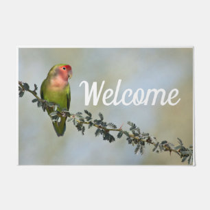 Rosy- faced love bird on a branch  doormat